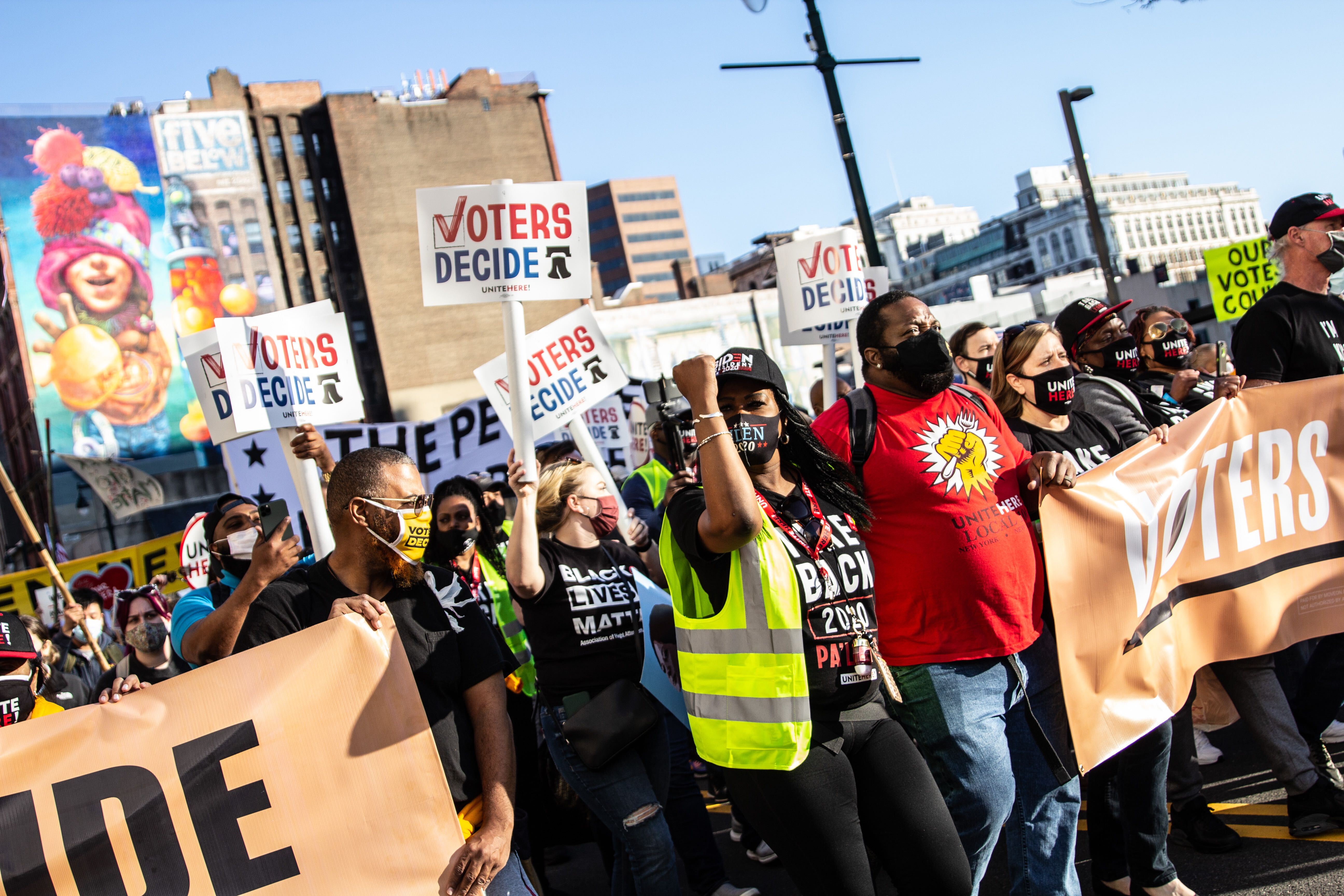 Demonstrators march through Center City Philadelphia to celebrate a Biden win. 