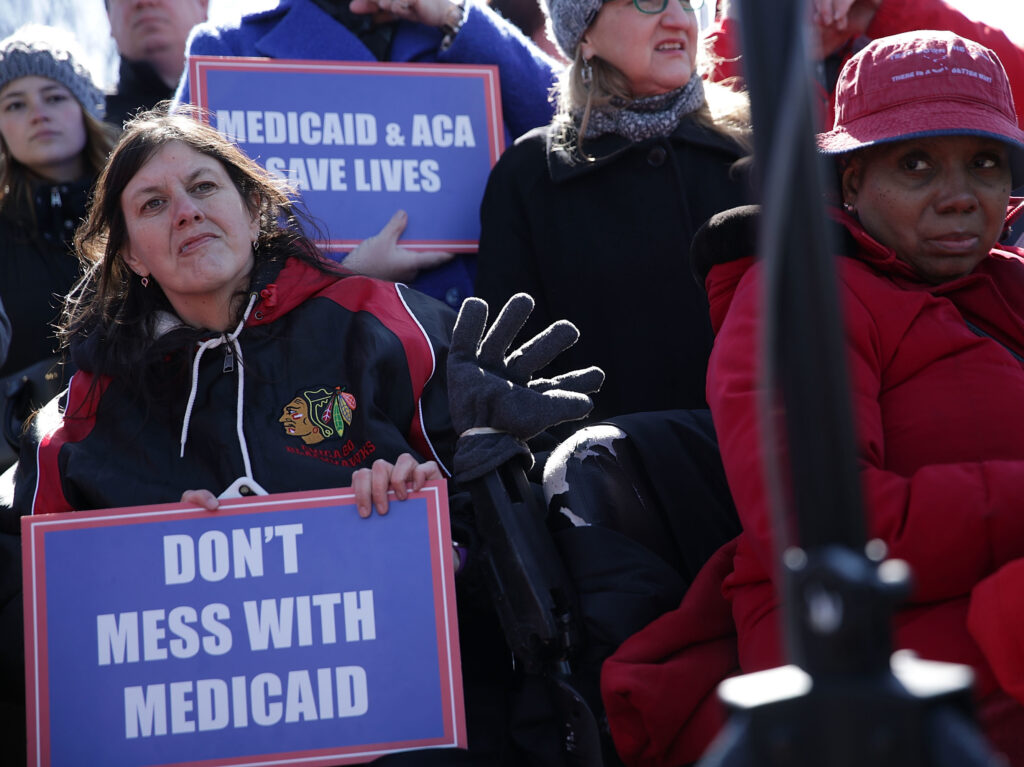 Health care activists rallied in front of the U.S. Capitol on March 22, 2017, to protest Republican efforts that would have dismantled the Affordable Care Act and capped federal payments for Medicaid patients. The Republican congressional bills, part of the party’s “repeal and replace” push in 2017, were eventually defeated. Health care activists rally in front of the U.S. Capitol