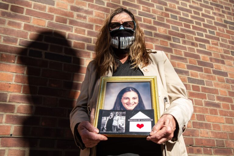 Elise Schiller holds a photo of her daughter Giana Natali
