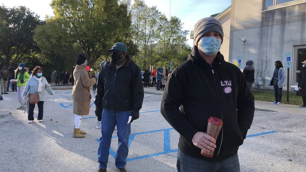 Matt Henrich waits in line to vote in West Philadelphia on Nov. 3. (Layla A. Jones/Billy Penn)