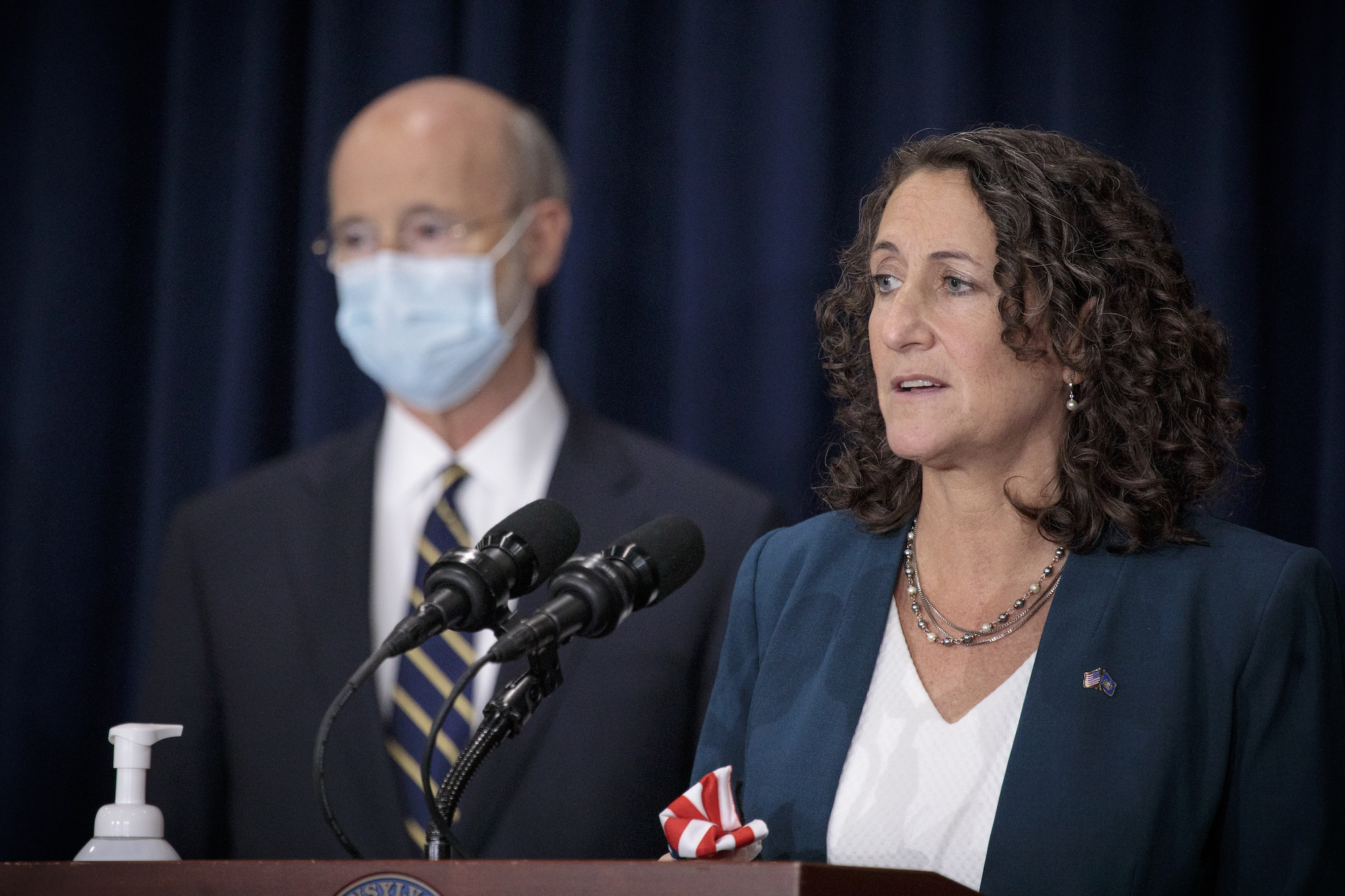 Secretary of State Kathy Boockvar (right) and Gov. Tom Wolf (left) answer questions from the press in Harrisburg.
