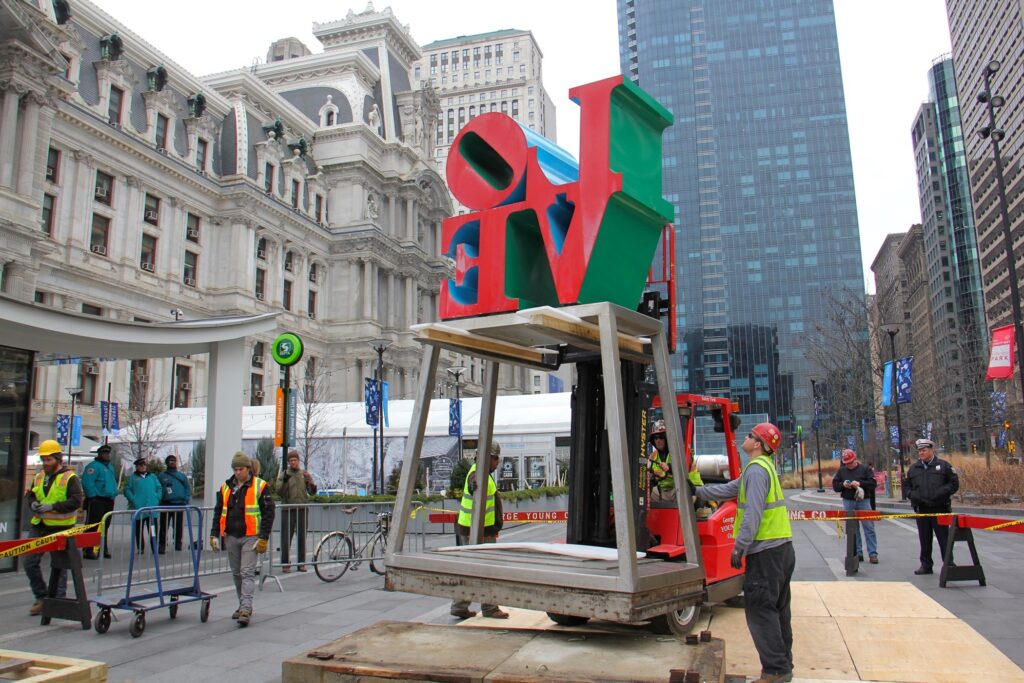 2017 02 15-e lee-philadelphia-love statue restoration Workmen raise the LOVE statue off its pedestal in Dilworth Park in February 2017