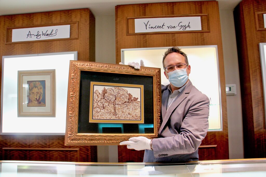 2020 12 18-e lee-bob strehlau-kennett square-pop up art museum van gogh Jeweler Bob Strehlau holds an ink drawing by Vincent Van Gogh