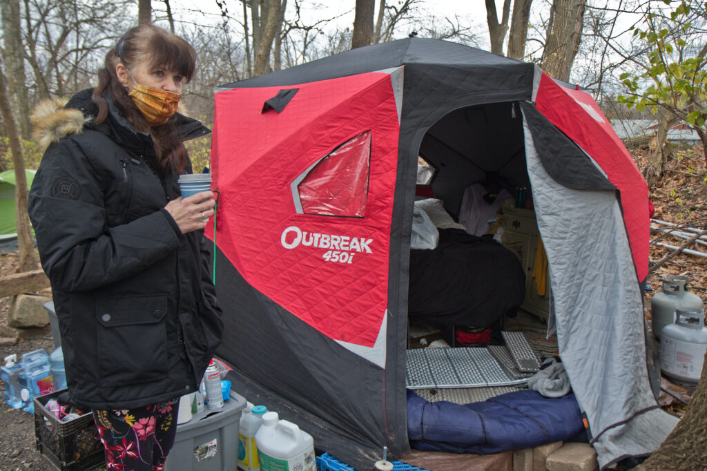 2020 12 4 k paynter norristown encampment for homeless-3 Dottie Spillane has been living near a creek in Norristown with her husband since the summer. She and her husband use a propane heater to heat their insulated tent as temperatures drop. (Kimberly Paynter/WHYY)