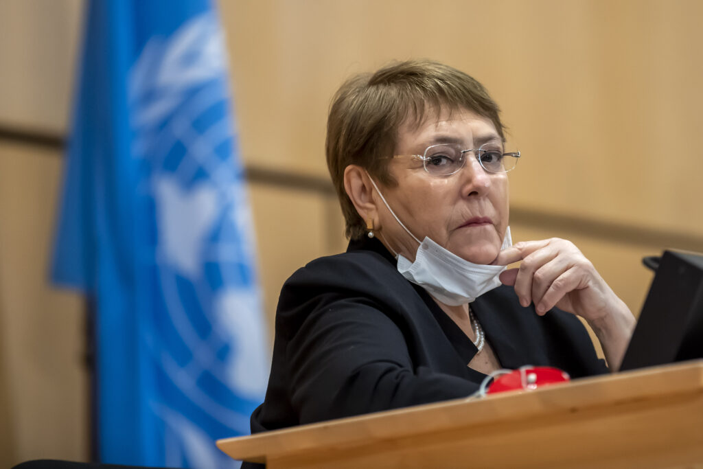 Switzerland Human Rights US FILE - In this Wednesday, June 17, 2020 file photo the High Commissioner for Human Rights, Michelle Bachelet, attends a meeting of the Human Rights Council of the United Nations in Geneva, Switzerland. The U.N. human rights chief is hailing “some extremely encouraging pledges” from U.S. President-elect Joe Biden, citing his call for efforts to address issues like systemic racism, women’s rights, torture and climate change. (Martial Trezzini/Keystone via AP, file)