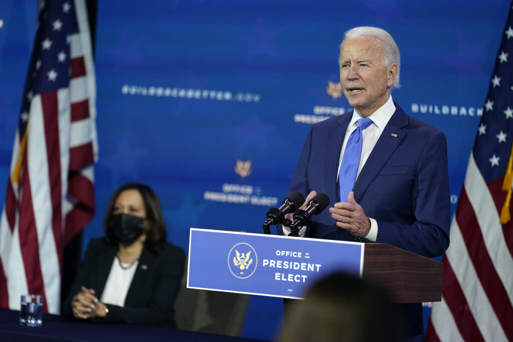 Joe Biden President-elect Joe Biden speaks as Vice President-elect Kamala Harris listens at left, during an event to introduce their nominees and appointees to economic policy posts at The Queen theater, Tuesday, Dec. 1, 2020, in Wilmington, Del. (AP Photo/Andrew Harnik)