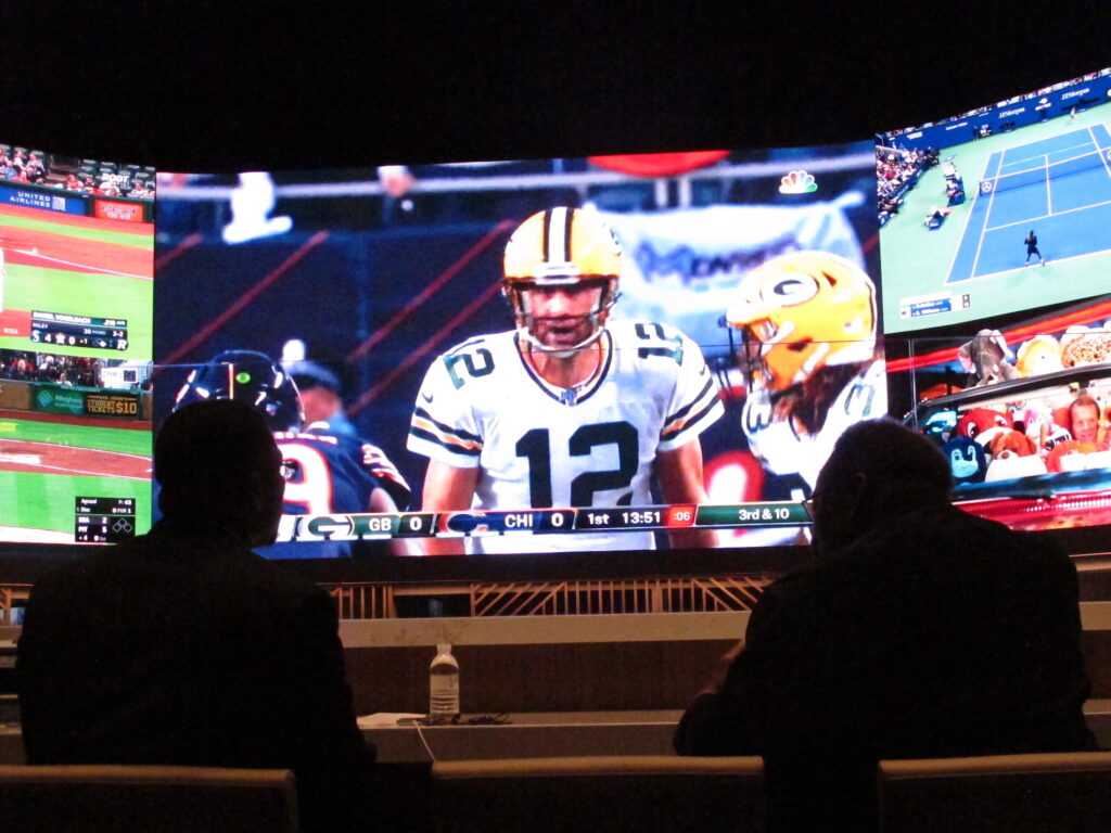 A gambler makes a sports bet at Bally's casino