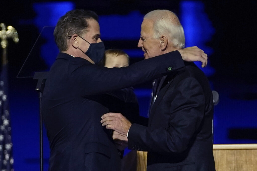 Joe Biden, Hunter Biden President-elect Joe Biden, right, embraces his son Hunter Biden, left, Saturday, Nov. 7, 2020, in Wilmington, Del. (AP Photo/Andrew Harnik, Pool)