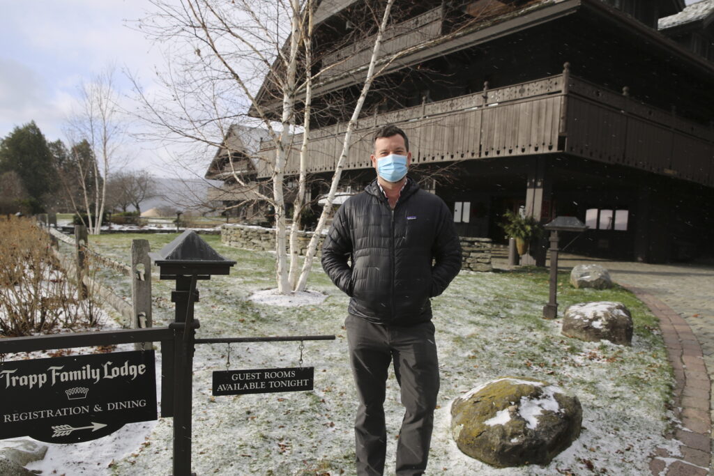 Virus Outbreak-Winter Travel Bob Schwartz, the director of marketing of the Trapp Family Lodge poses outside the lodge on Tuesday, Dec. 15, 2020 in Stowe, Vt. (AP Photo/Wilson Ring)