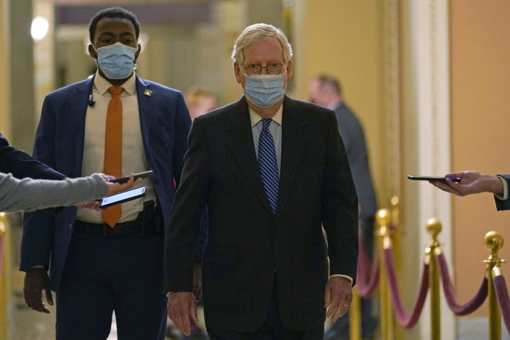 Mitch McConnell Senate Majority Leader Mitch McConnell of Ky., walks past reporters on Capitol Hill in Washington, Tuesday, Dec. 15, 2020. (AP Photo/Susan Walsh)