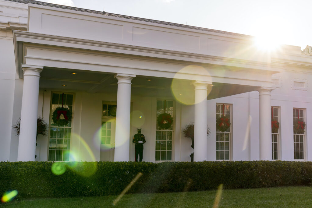 Trump A Marine stands outside the entrance to the West Wing of the White House, signifying the President is in the Oval Office, Tuesday, Dec. 22, 2020, in Washington. (AP Photo/Andrew Harnik)