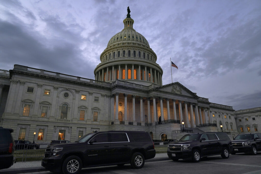 Virus Outbreak Congress Dusk falls over the Capitol building