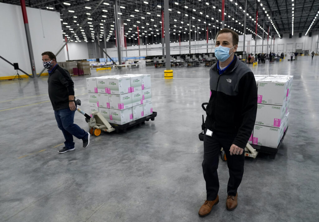 Virus Outbreak Moderna Vaccine Boxes containing the Moderna COVID-19 vaccine are prepared to be shipped at the McKesson distribution center