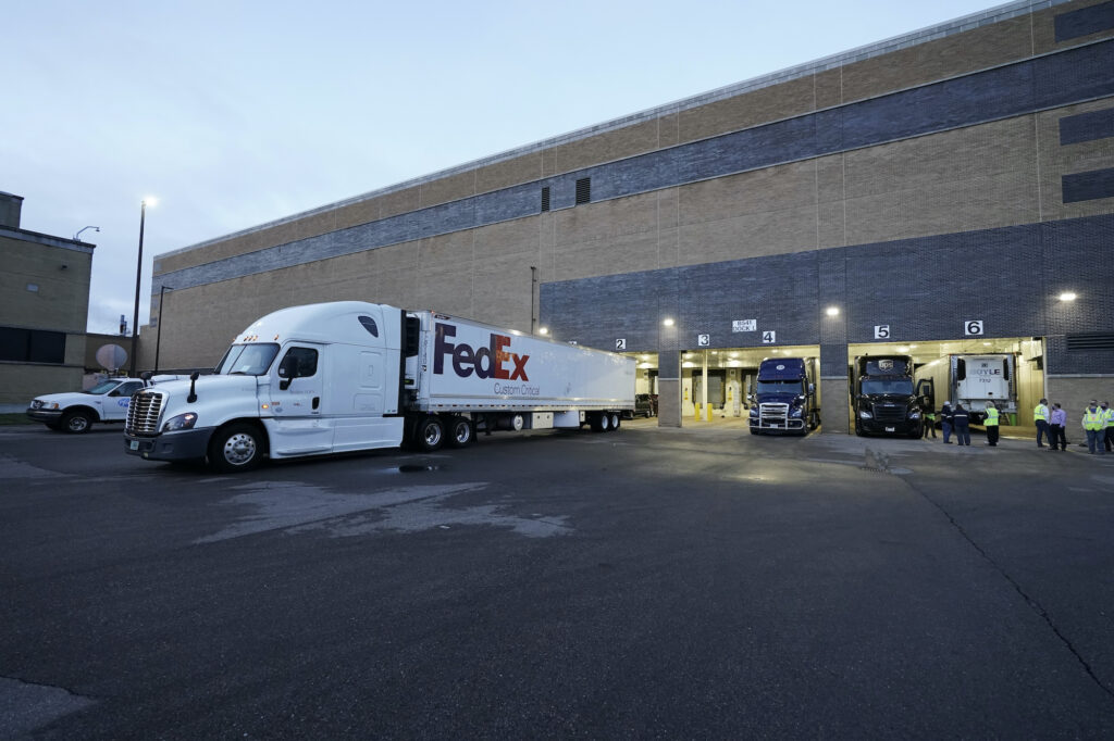 Virus Outbreak Pfizer Vaccine Boxes containing the Pfizer-BioNTech COVID-19 vaccine are prepared to be shipped at the Pfizer Global Supply Kalamazoo manufacturing plant in Portage