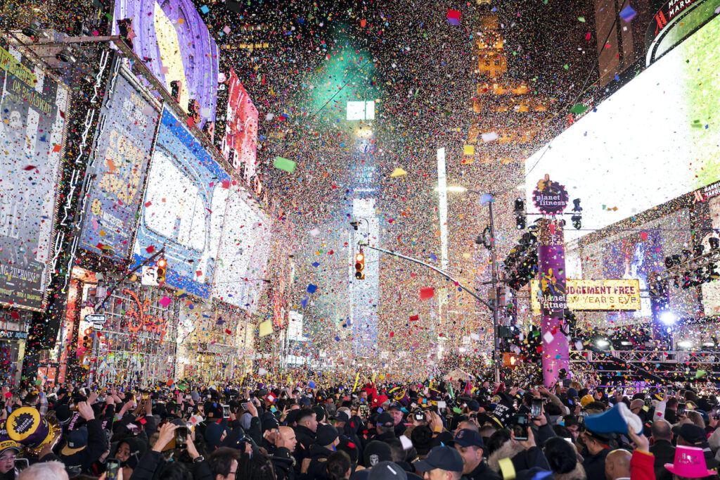 Virus Outbreak-New Year’s Eve Confetti falls at midnight on the Times Square New Year's Eve celebration in New York