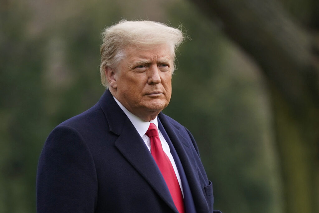 Donald Trump President Donald Trump walks on the South Lawn of the White House in Washington before boarding Marine One