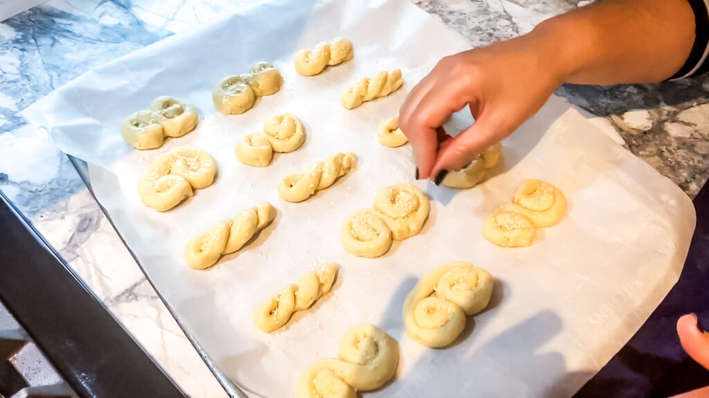 Culinary arts teacher Mrs. Mylonas shows how to make special Greek cookies
