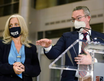 Election 2020 Pennsylvania Voting Philadelphia City Commissioners Al Schmidt, right, and Lisa Deeley speak to the media as election workers process ballots for the general election, at the Pennsylvania Convention Center, Tuesday, Nov. 3, 2020, in Philadelphia. (AP Photo/Matt Slocum)