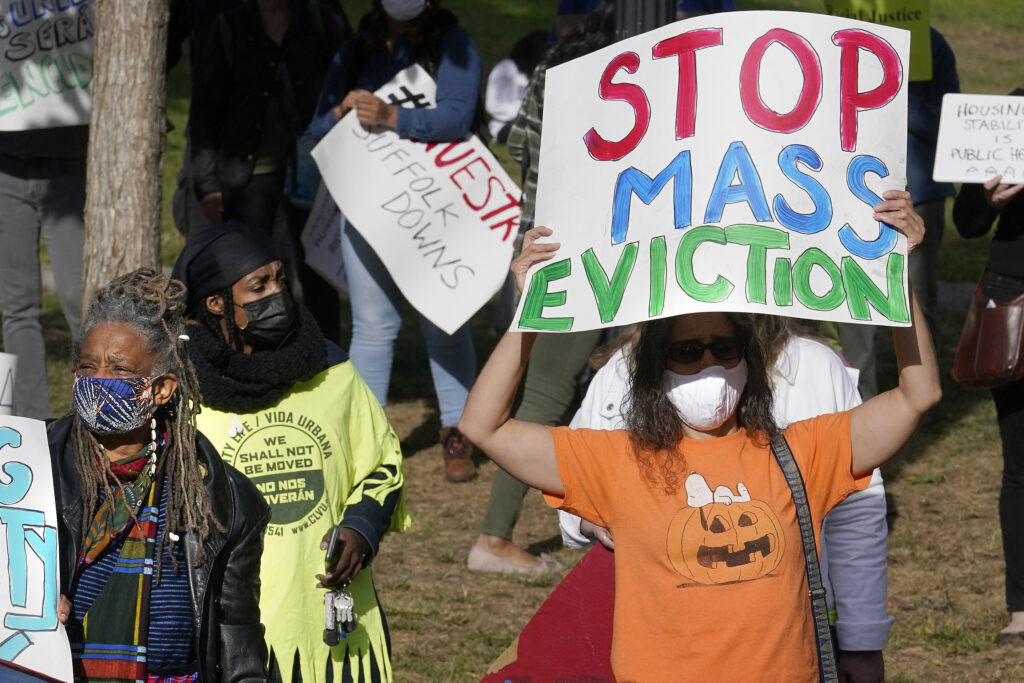 Protesters call for support for tenants and homeowners at risk of eviction during a demonstration on Oct. 11 in Boston