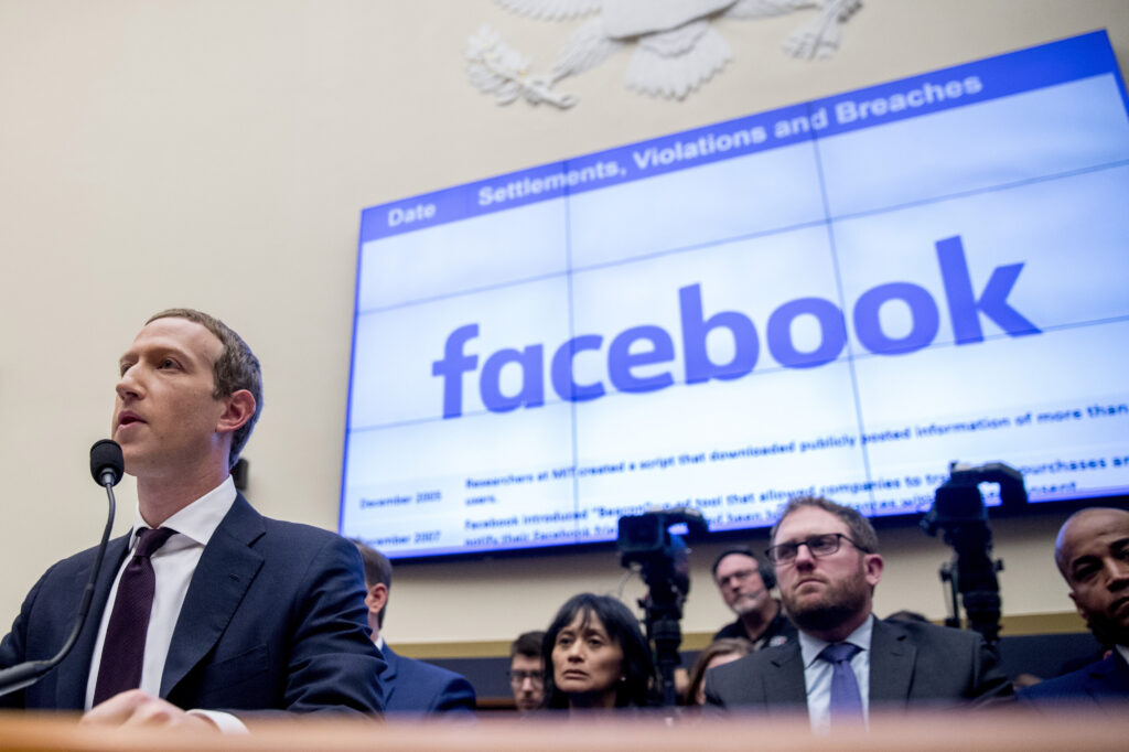 Facebook CEO Mark Zuckerberg testifying before a House Financial Services Committee hearing in 2019. Facebook CEO Mark Zuckerberg testifying before a House Financial Services Committee hearing