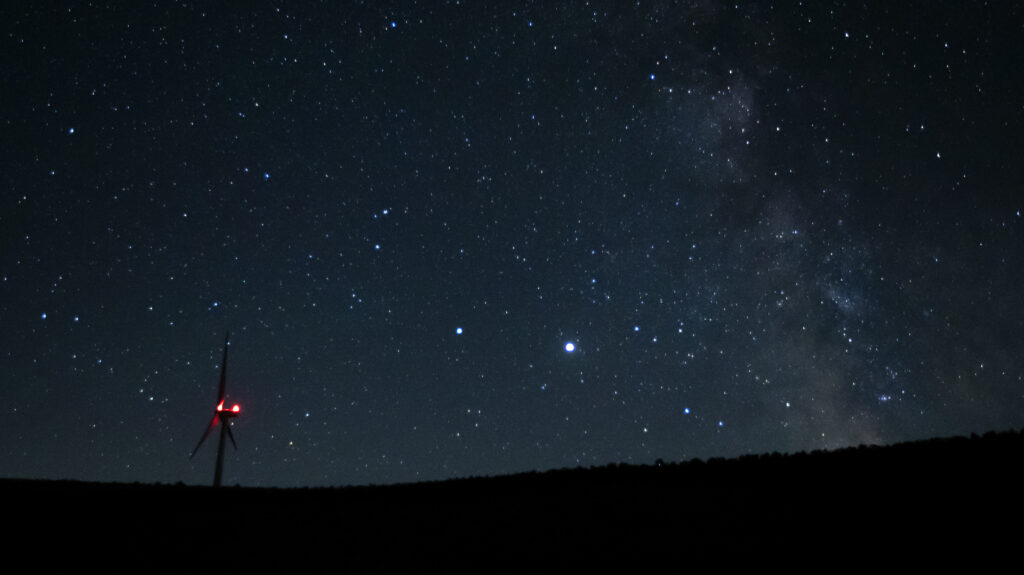 Saturn (center, left) and Jupiter (center, right) share a night sky earlier this year near Vantage, Wash. Already this past summer, the two planets were growing closer in the night sky. Saturn (center, left) and Jupiter (center, right) share a night sky earlier this year near Vantage, Wash. Already this past summer, the two planets were growing closer in the night sky. (Ted S. Warren/AP)