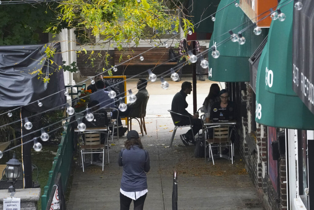 Virus Outbreak New York Customers sit outside a restaurant offering outdoor service in New York