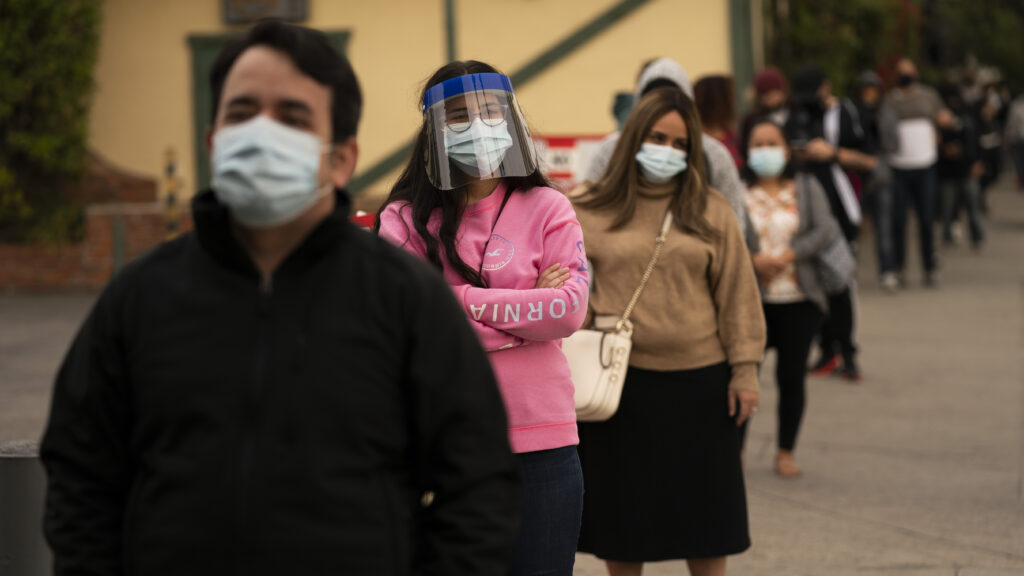 People wait in line for coronavirus tests in Los Angeles
