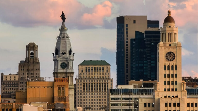 Philadelphia City Hall is visible in a view of the Philadelphia skyline.