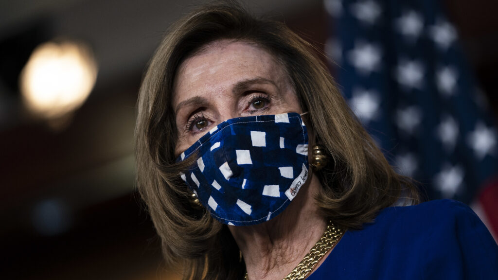 House Speaker Nancy Pelosi, D-Calif., is pictured on Capitol Hill on Nov. 20. The House voted Monday to increase direct payments to Americans above what is provided in the COVID-19 relief legislation President Trump signed on Sunday. (Drew Angerer/Getty Images)
