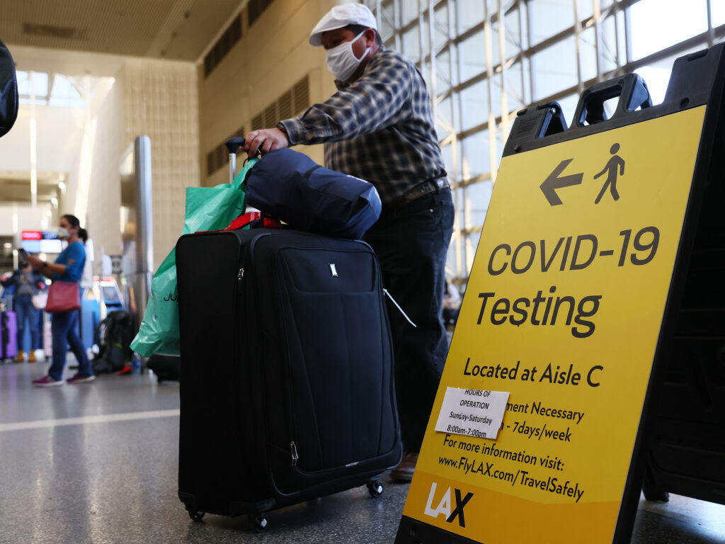 The U.S. Centers for Disease Control and Prevention issued a new coronavirus testing mandate for travelers coming from the U.K. with the goal of blocking the spread of a new virus variant that originated in England. The U.S. Centers for Disease Control and Prevention issued a new coronavirus testing mandate for travelers coming from the U.K. with the goal of blocking the spread of a new virus variant that originated in England. (Mario Tama/Getty Images)