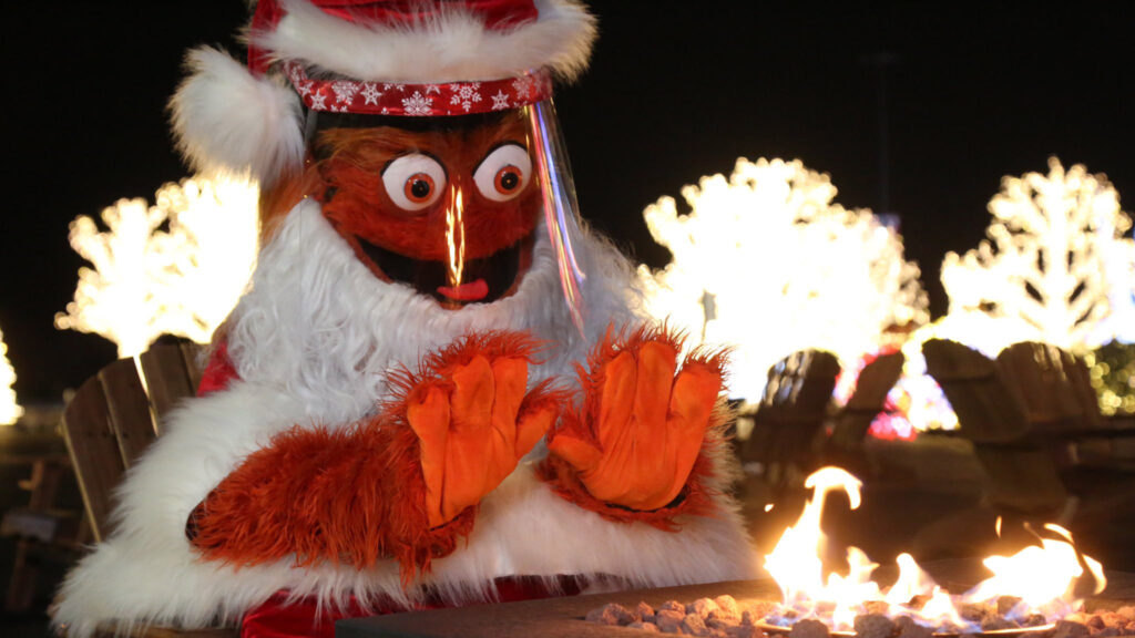 gritty-faceshieldmask Gritty dressed as Santa Claus wearing a face shield