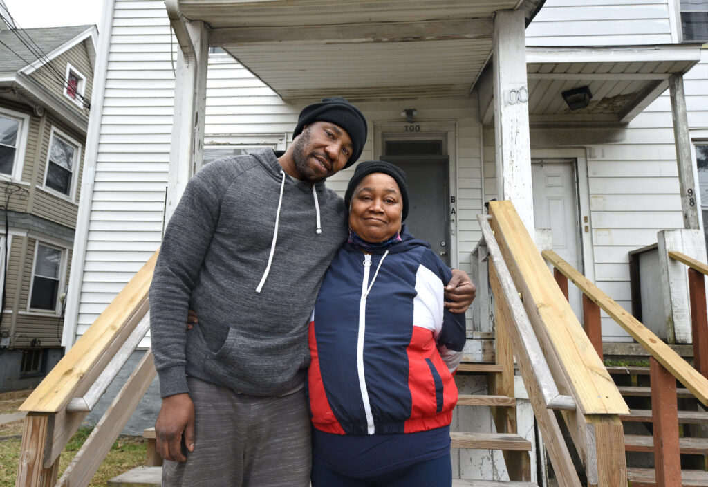 jail02 Husband and wife Darnell Williams and Patrice Mosley in front of their Millville home; Williams was recently released from the Cumberland County jail. (April Saul for WHYY)