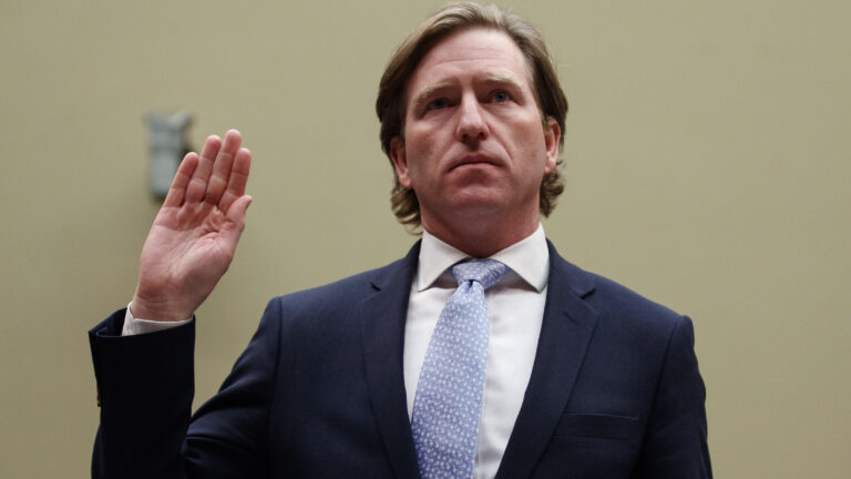 Christopher Krebs, recently ousted as director of the Department of Homeland Security's Cybersecurity and Infrastructure Security Agency, is sworn in to testify last year on Capitol Hill. (Carolyn Kaster/AP)
