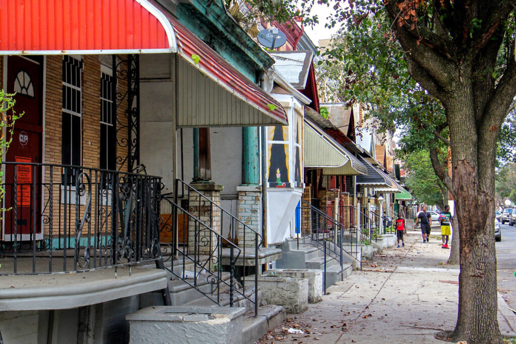 2019 10 02-e lee-philadelphia n 15th st-shooting aftermath bulle Rowhouses in North Philadelphia.