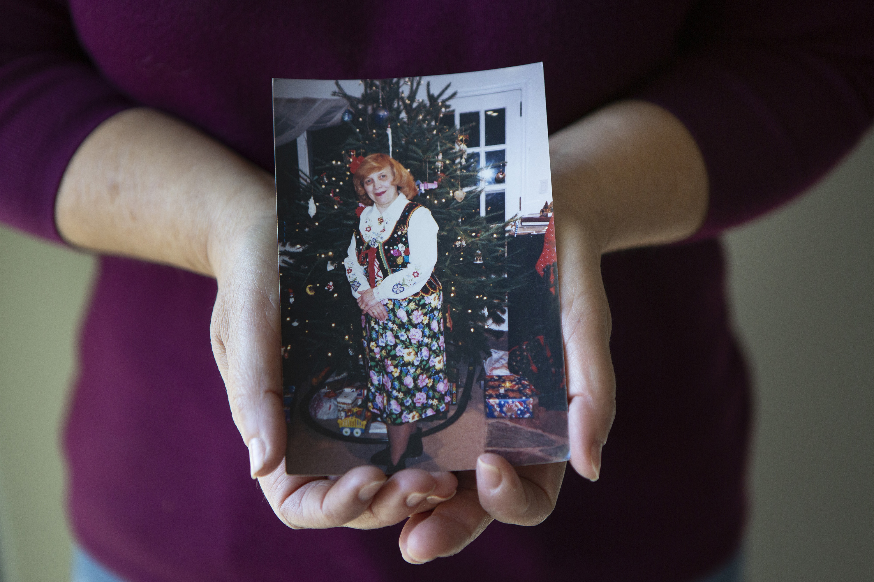 Dorothy Cassaro holds a photo of her mother, Annette Kociolek, 93, who passed away on March 30.