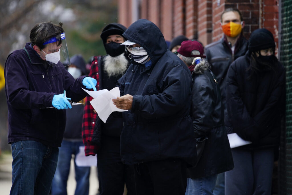 Virus Outbreak Pennsylvania People line up outside a community center to take a free COVID-19 test