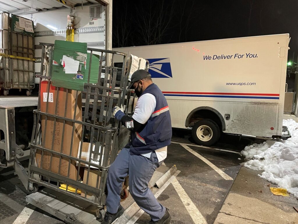 Rickey Ramirez is working overtime to keep up with the crush of Christmas deliveries.