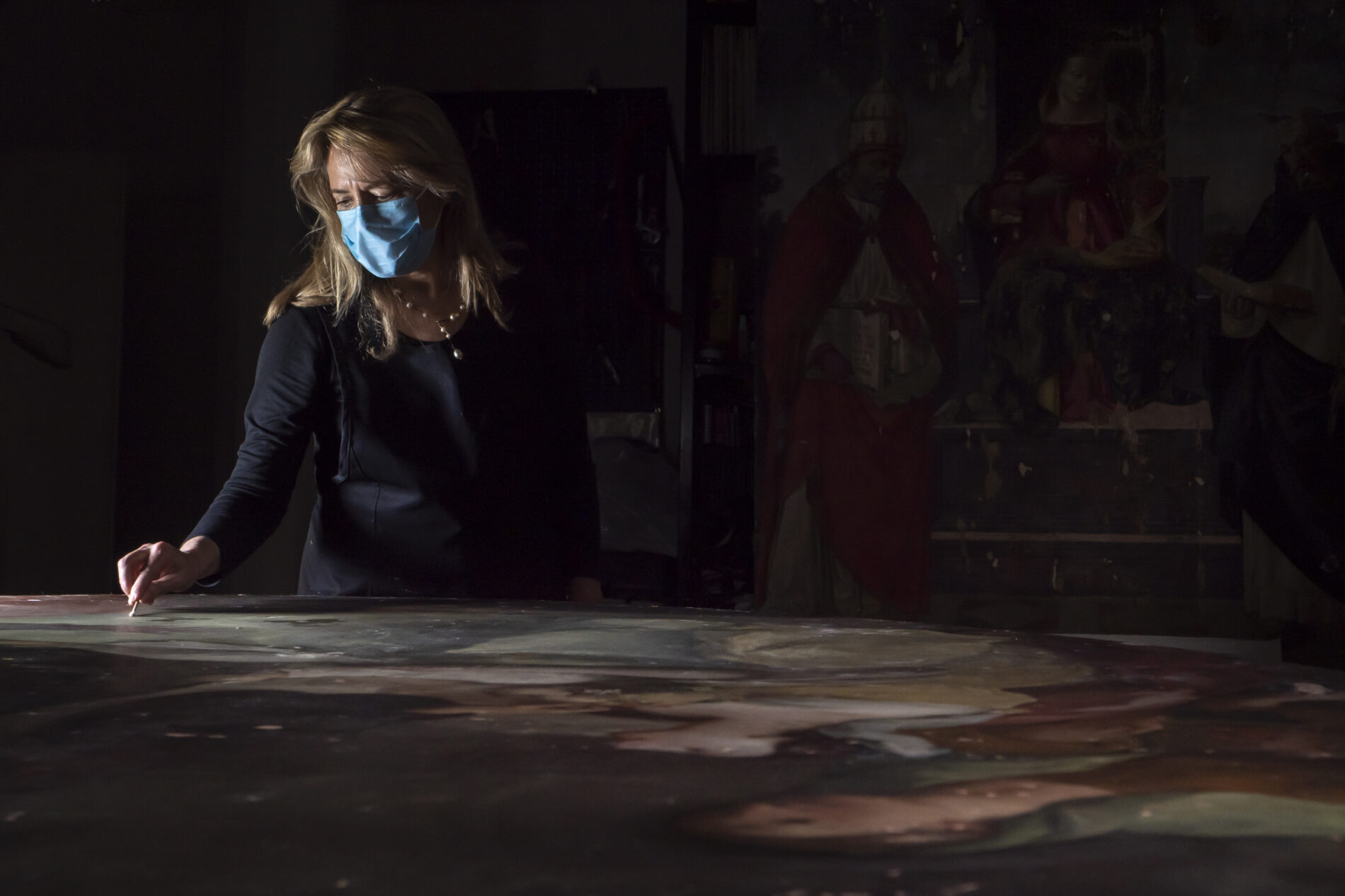Conservator Elisabeth Wicks at work.