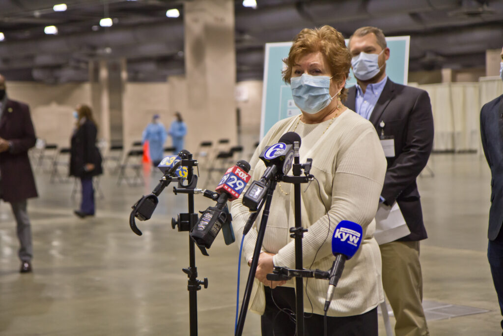 2021 01 08 k paynter convention center vaccine opening-2 Philadelphia Deputy Health Commissioner Dr. Caroline Johnson speaks at the opening of Philly Fighting COVID's vaccine clinic at the Pennsylvania Convention Center. (Kimberly Paynter/WHYY)