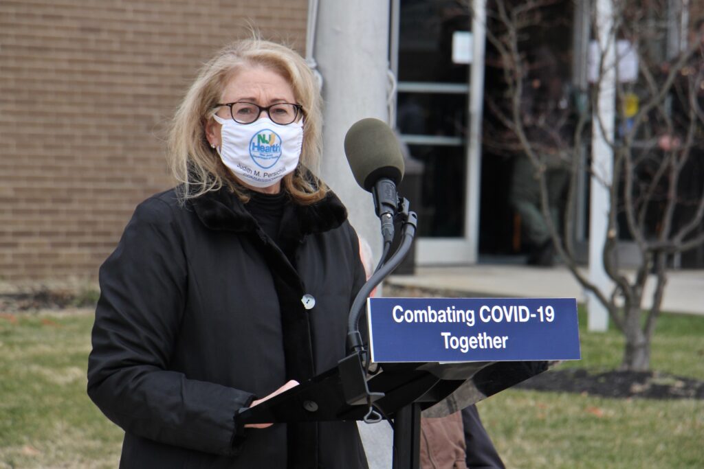 2021 01 11-e lee-judith persichilli-sewell rowan college of south jersey-mass vaccination covid 19 New Jersey Health Commissioner Judith Persichilli speaks at the opening of a mass vaccination site at Rowan College