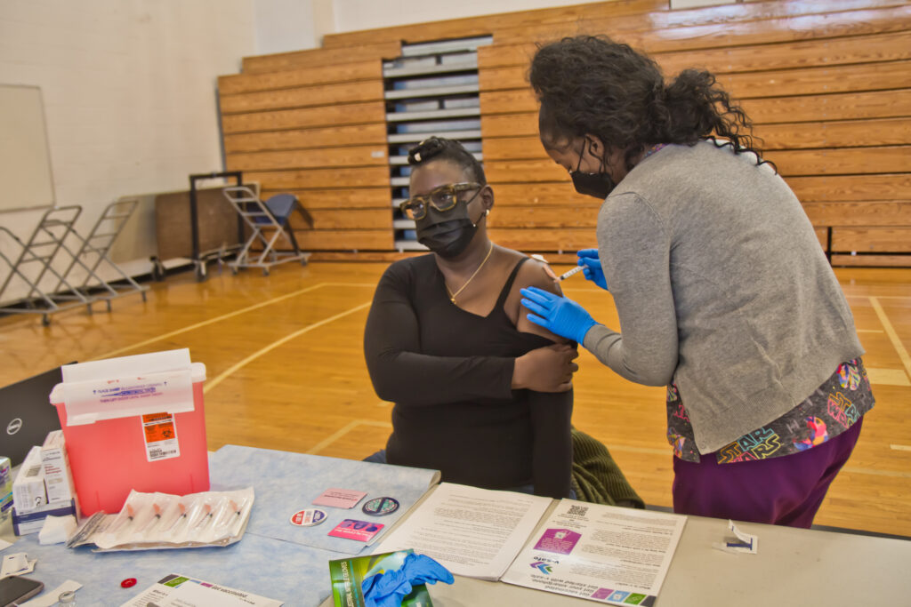 2021 01 22 k paynter school nurse vaccination clinic-6 Bartram High School nurse Monica Harmon said she was excited to receive the Moderna COVID-19 vaccine at the city’s school nurse vaccination clinic on Jan. 22, 2021. (Kimberly Paynter/WHYY)