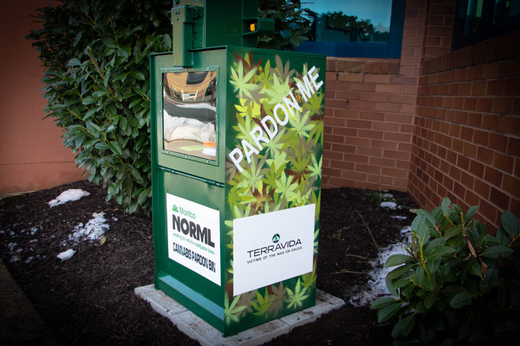 511D9E8B-6C8A-4B12-B881-9FE90945D71D An old newspaper box holds marijuana pardon applications