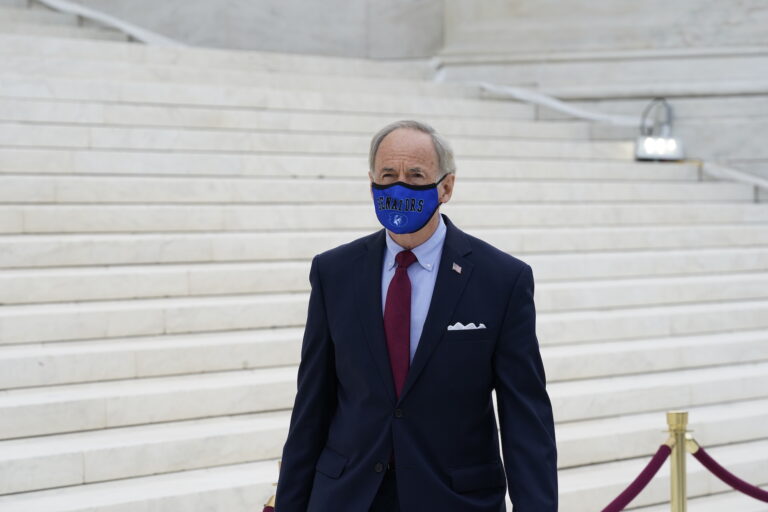 Sen. Tom Carper, D-Del., on the front steps of the U.S. Supreme Court building on Thursday, Sept. 24 2020, in Washington. (AP Photo/Alex Brandon)