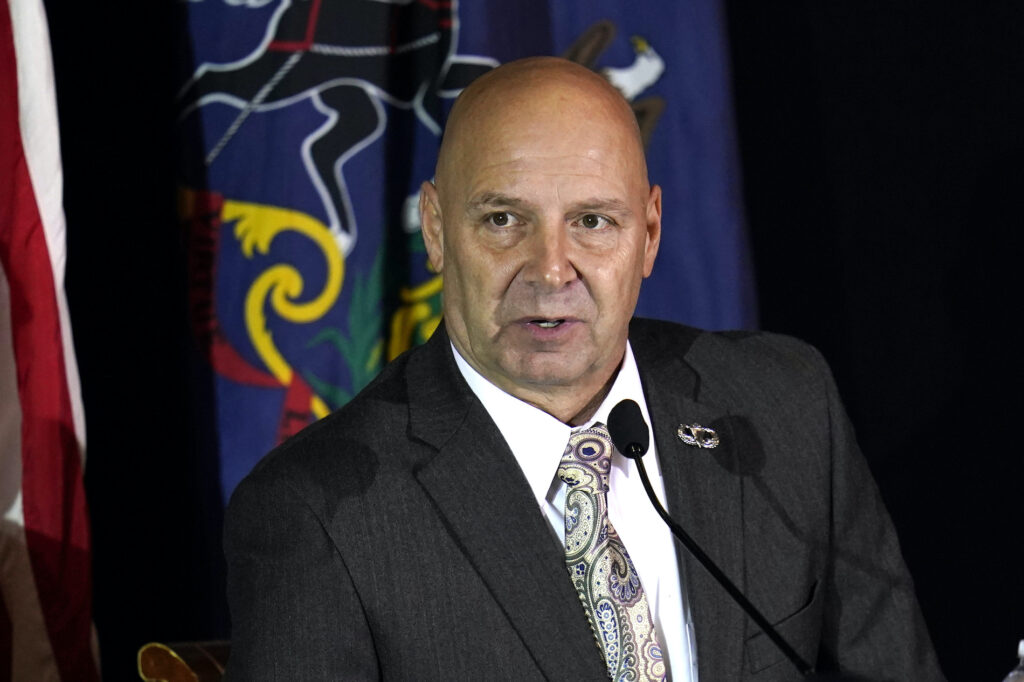 In this Wednesday, Nov. 25, 2020 file photo, Pennsylvania state Sen. Doug Mastriano, R-Franklin, attends a hearing of the Pennsylvania State Senate Majority Policy Committee in Gettysburg, Pa. (AP Photo/Julio Cortez)