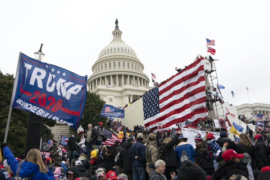 Capitol Breach Racism Protests In this Jan. 6, 2021, file photo, supporters of President Donald Trump stand outside the U.S. Capitol in Washington. (AP Photo/Jose Luis Magana)