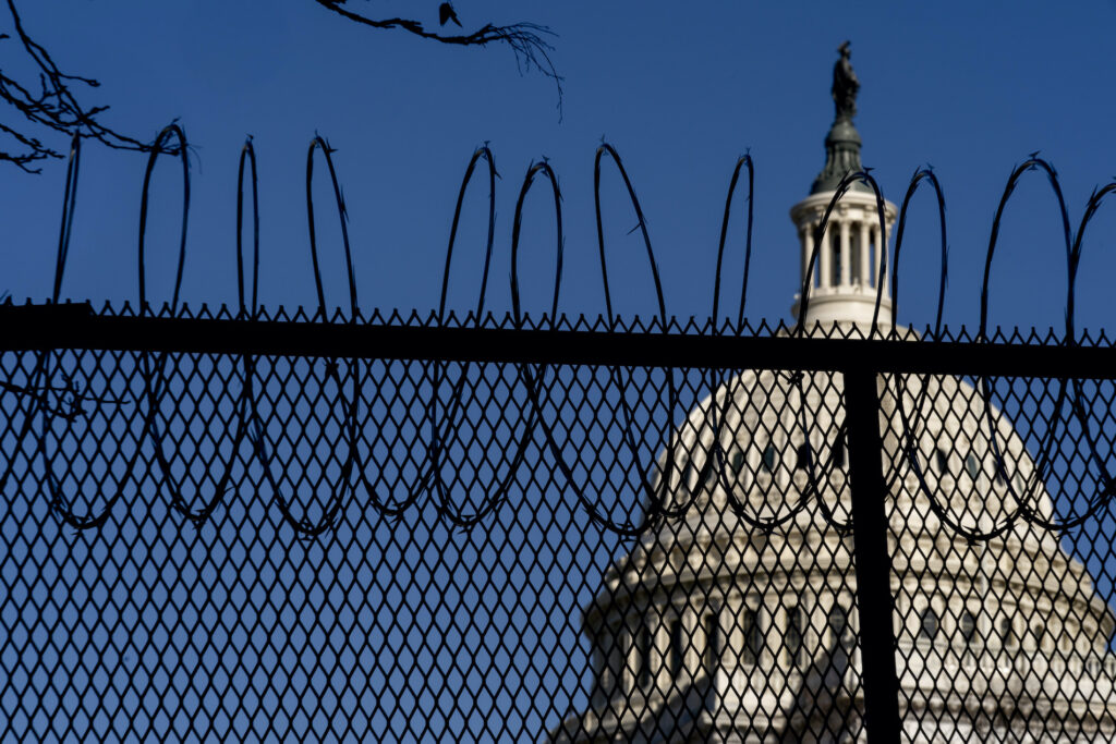 Capitol Breach The Dome of the Capitol Building is visible through razor wire installed on top of fencing on Capitol Hill in Washington, Thursday, Jan. 14, 2021. (AP Photo/Andrew Harnik)