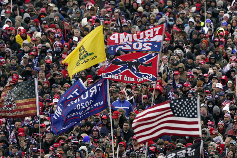 People listen as President Donald Trump speaks during a rally Wednesday, Jan. 6, 2021, in Washington. (AP Photo/Evan Vucci)