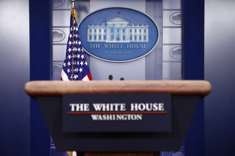 A podium in the James Brady Press Briefing Room of the White House