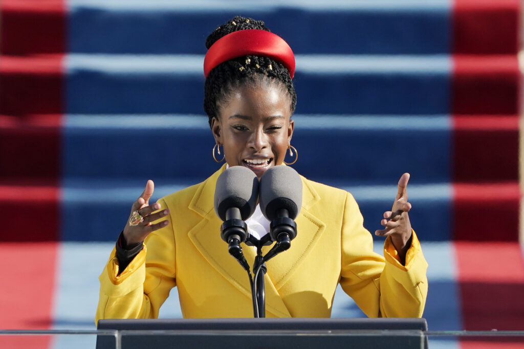 Biden Inauguration American poet Amanda Gorman reads a poem during the 59th Presidential Inauguration at the U.S. Capitol in Washington, Wednesday, Jan. 20, 2021. (AP Photo/Patrick Semansky, Pool)