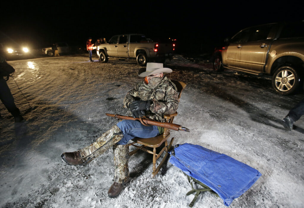 LaVoy Finicum In this Jan. 5, 2016 file photo Arizona rancher LaVoy Finicum holds a gun as he guards the Malheur National Wildlife Refuge near Burns, Ore. (AP Photo/Rick Bowmer)